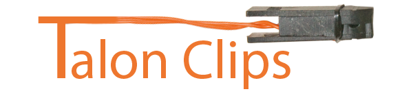 Talon Clip mit orangefarbenem Anschlusskabel